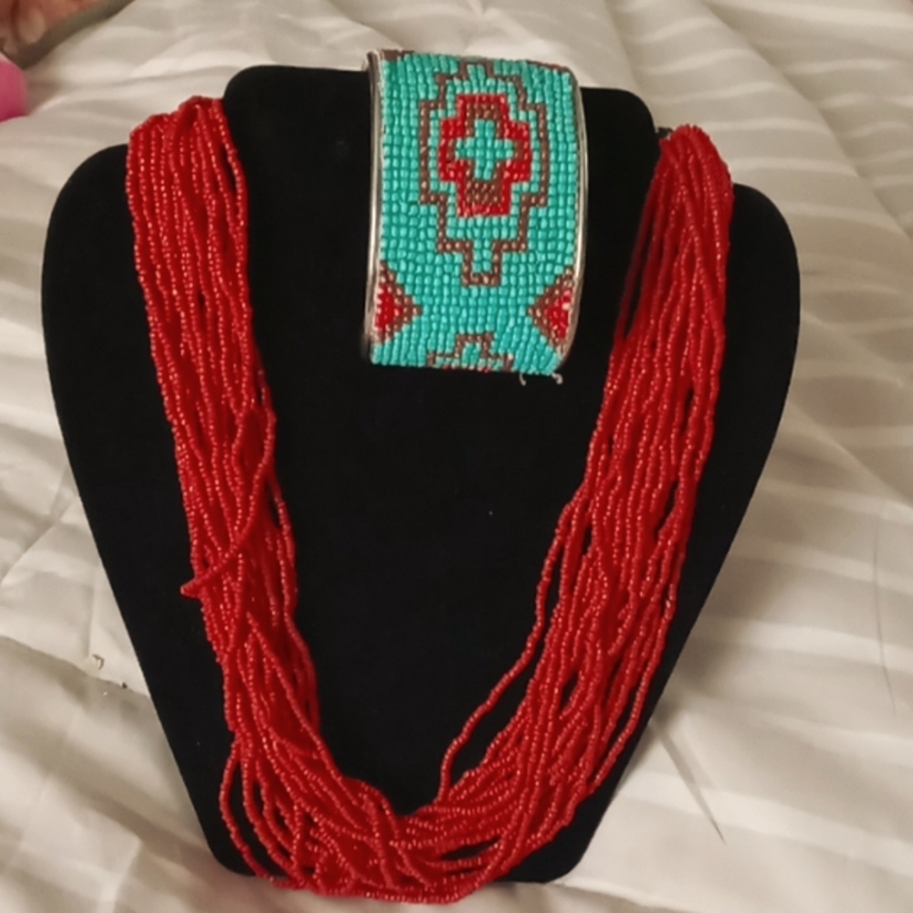 Beautiful hand strung coral necklace and cuff bracelet.